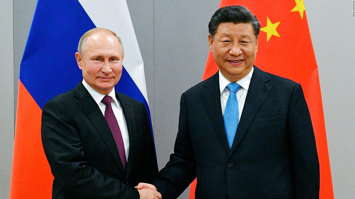 Vladimir Putin (presidente de  Rusia) y el premier de China