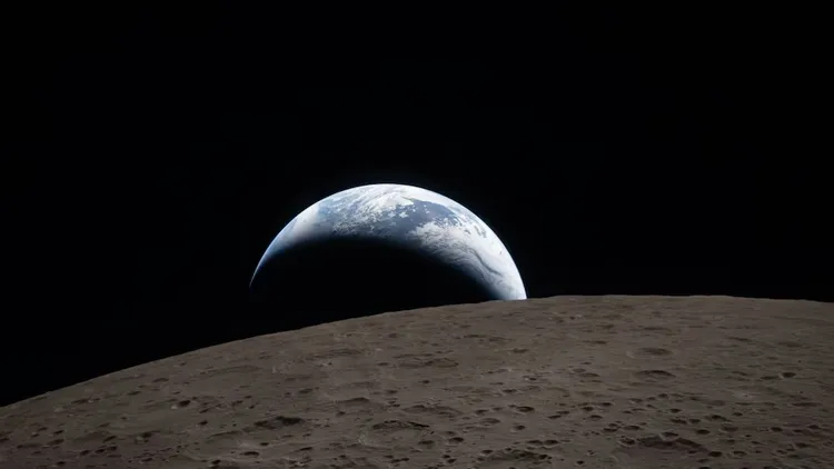 La Tierra emerge sobre el horizonte lunar en una recreación de la histórica “Earthrise” captada por Artemis II.