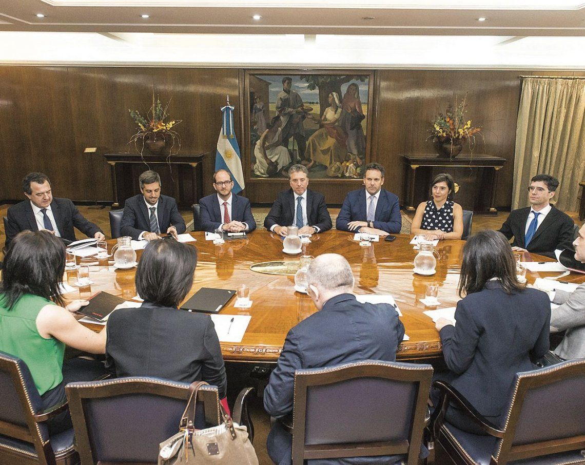 Dujovne y Sandleris con los representantes del Fondo Monetario.